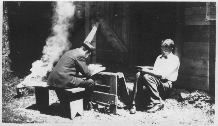 Illustrator Harrison Cady at work with Thornton W. Burgess.