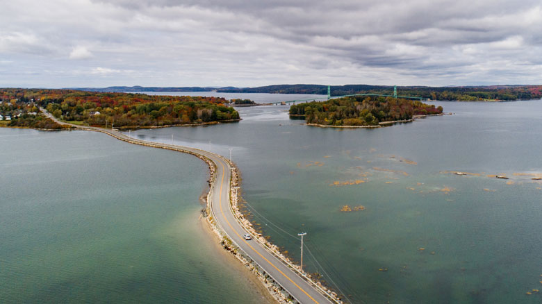 An aerial view of the Deer Isle Causeway looking northerly. The causeway is the only roadway linking Deer Isle and Stonington to the mainland